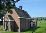 De rechtergevel van het pandje is geheel blind, de uitbouw is later aangebracht
<br/>
Richard Keijzer, 2015-08-22